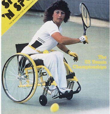 Marilyn Hamilton in a wheelchair playing tennis. 
      Description follows.